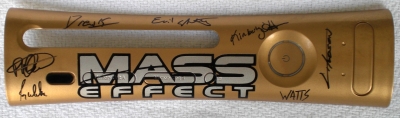 This plate was made specifically for the Mass Effect launch event in Edmonton, Alberta Canada. It was signed by Lead Designer Preston Watamaniuk, Lead Writer Drew Karpyshyn, Project Director Casey Hudson, Quality Assurance Lead Kim Hansen, Lead Artist Derek Watts, and Marketing Leads Jay Watamaniuk and Chris 