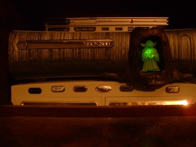 This plate featured the swamp of Dagobah in the background, with an epoxy putty sculpted tree stump, and a Spirit of Yoda figure. Yoda lights up when the unit is powered up.