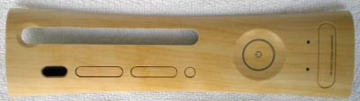 While the Woody plate with the green and red stripe was released in the US, this pale plate that looks like it should be part of a baseball bat was released in Japan. It seems to be the least common of the non-US first-party plates, with the other plates being the orange sun swirl, pink balloons and finally the water puzzle.